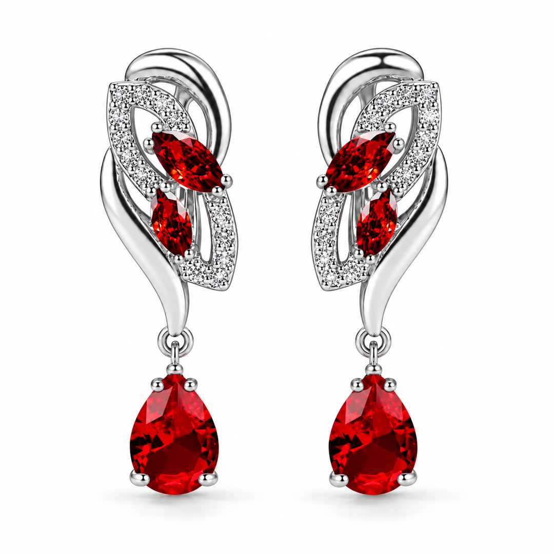 Iris Drop Earrings in Scarlet, a matching pair with a silver leaf-inspired setting and faceted pear drops on white