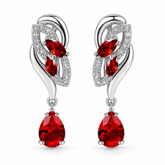 Iris Drop Earrings in Scarlet, a matching pair with a silver leaf-inspired setting and faceted pear drops on white