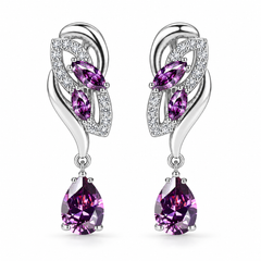 Iris Drop Earrings in Violet, a matching pair with a silver leaf-inspired setting and faceted pear drops on white