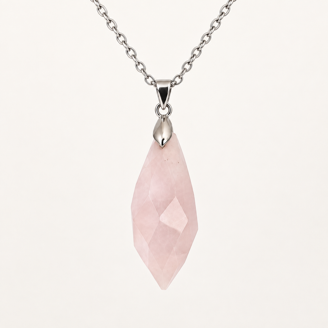 Meteor Blush faceted pendant, centred silver-tone fitting and fine chain on a light background