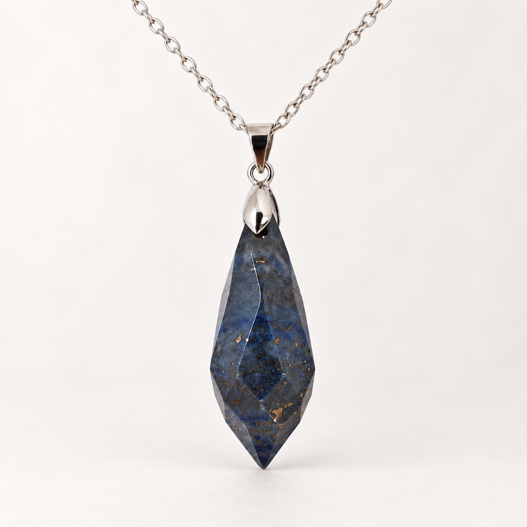 Meteor Cobalt faceted pendant, centred silver-tone fitting and fine chain on a light background