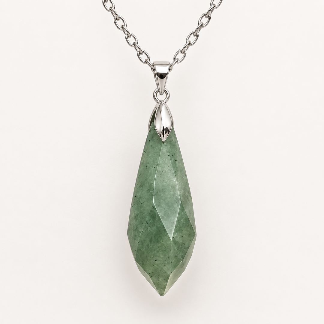 Meteor Green faceted pendant, centred silver-tone fitting and fine chain on a light background