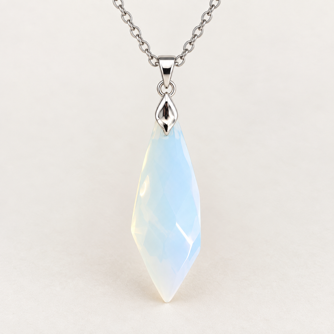 Meteor Opaline faceted pendant, centred silver-tone fitting and fine chain on a light background