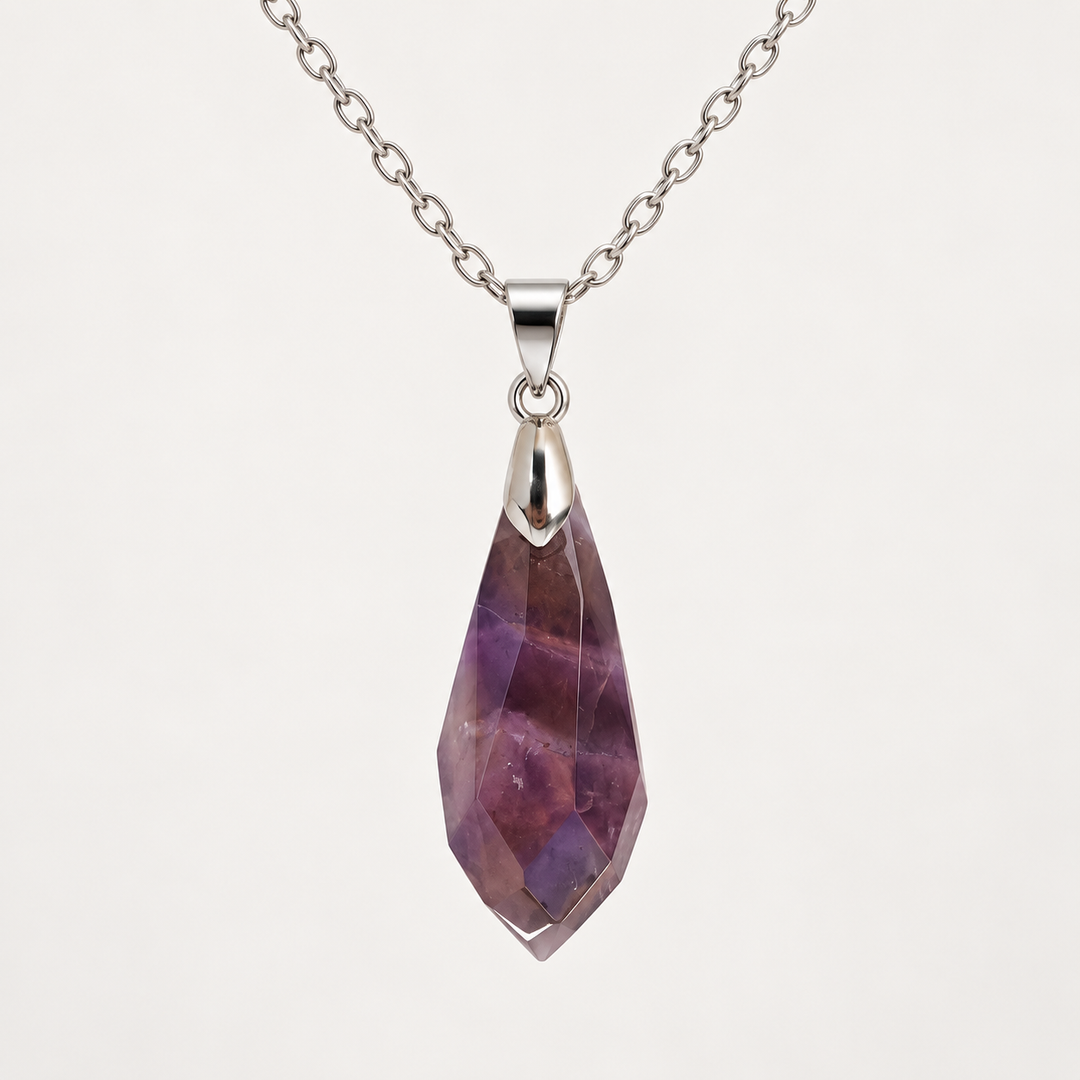 Meteor Violet faceted pendant, centred silver-tone fitting and fine chain on a light background