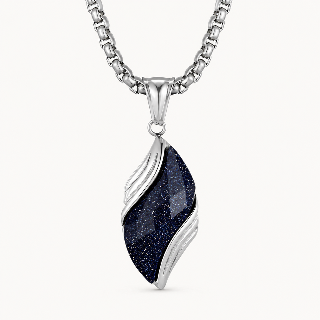 Nebula silver and deep blue glitter necklace on a warm white background