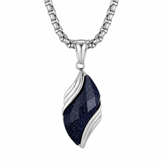 Nebula necklace with faceted blue sandstone and sculpted silver frame on white
