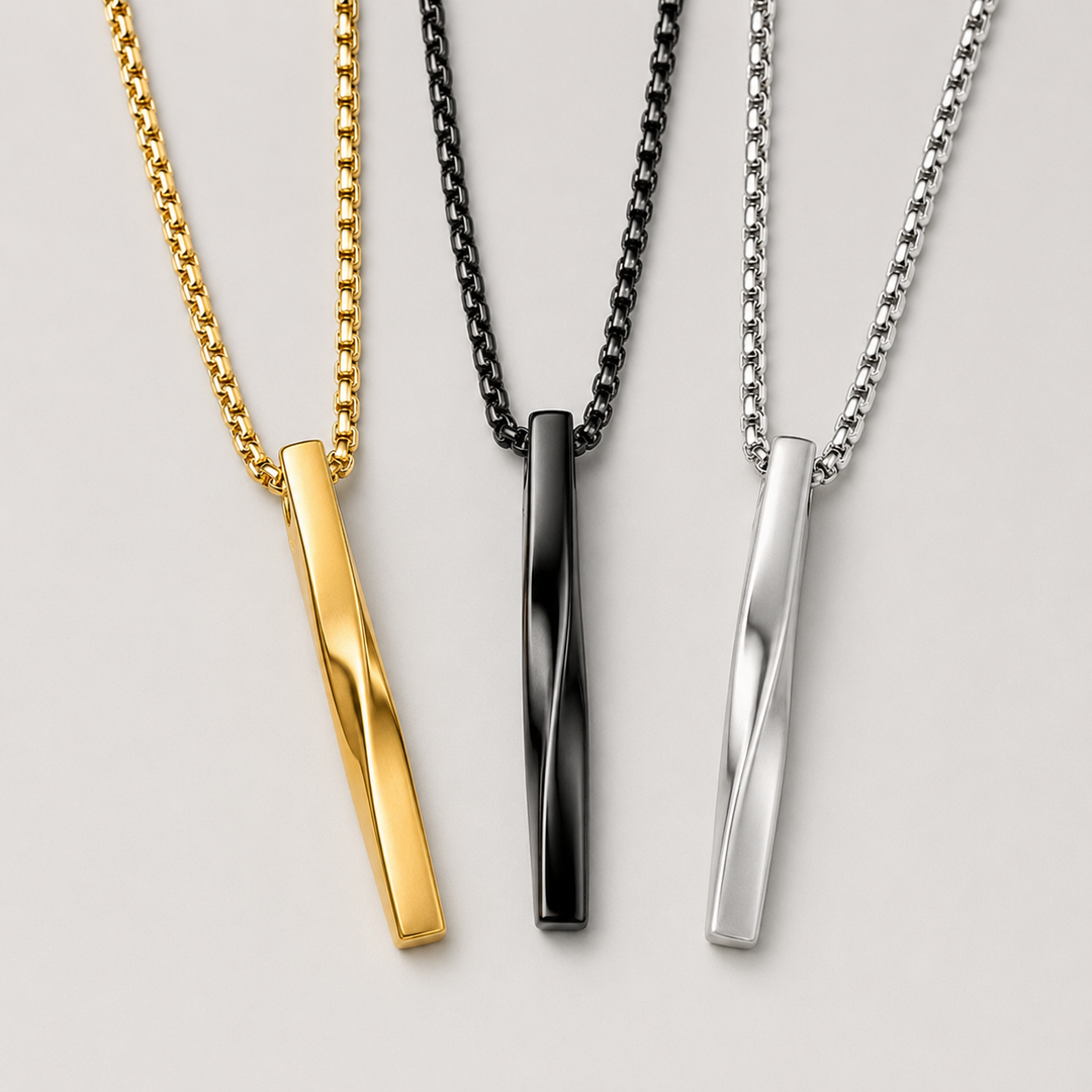 Obelisk necklaces in Gold, Obsidian and Steel finishes