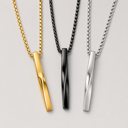 Obelisk necklaces in Gold, Obsidian and Steel finishes