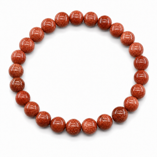Origin Gilt copper-orange stone bracelet on white background