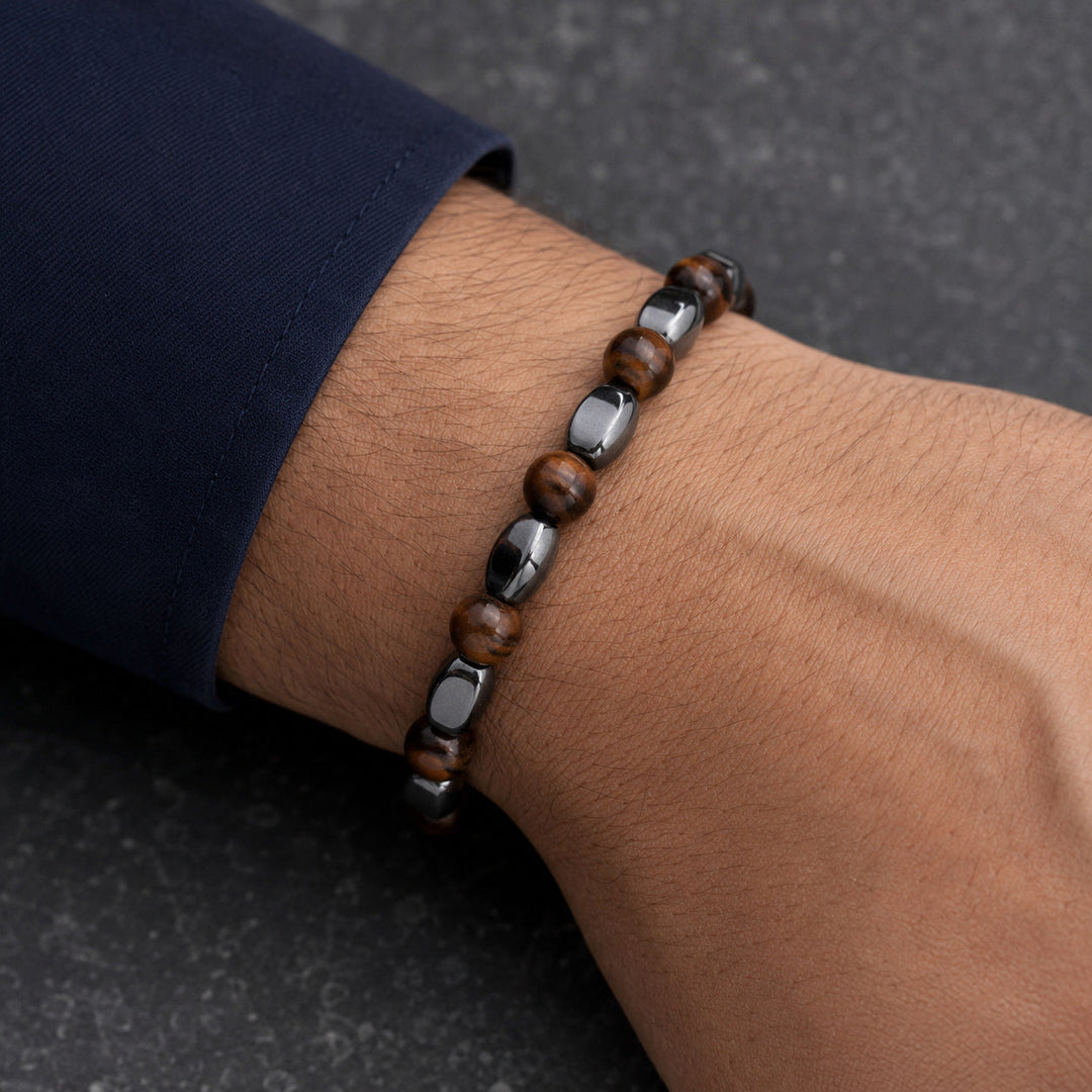 Prism Copper stone and hematite bracelet worn with a navy cuff