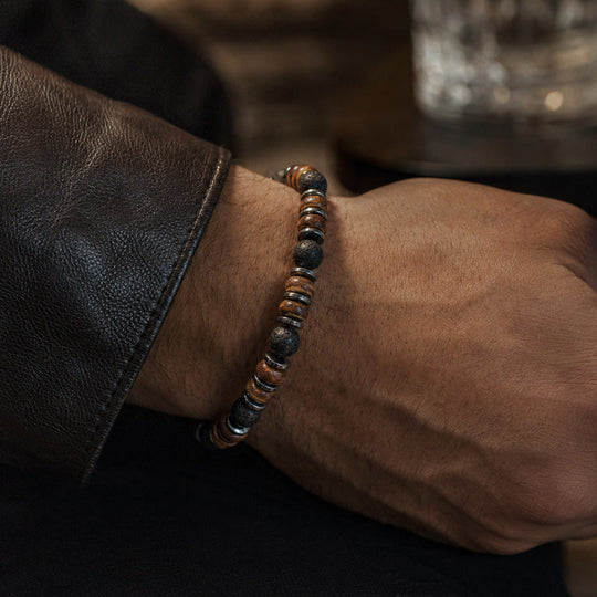 Relic mixed-material bracelet worn with a dark leather jacket