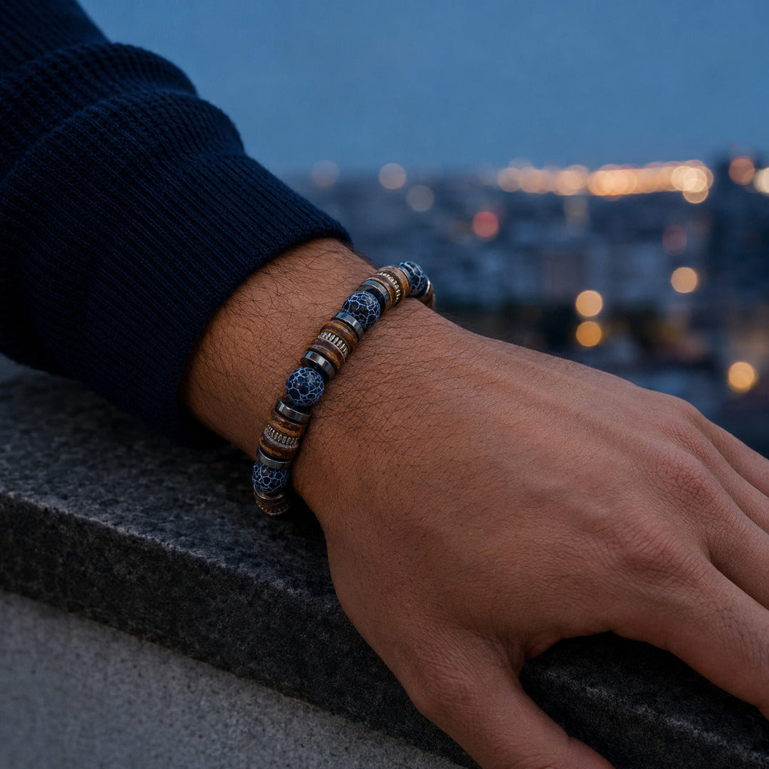 Relic Rift bracelet worn against a city backdrop at blue hour