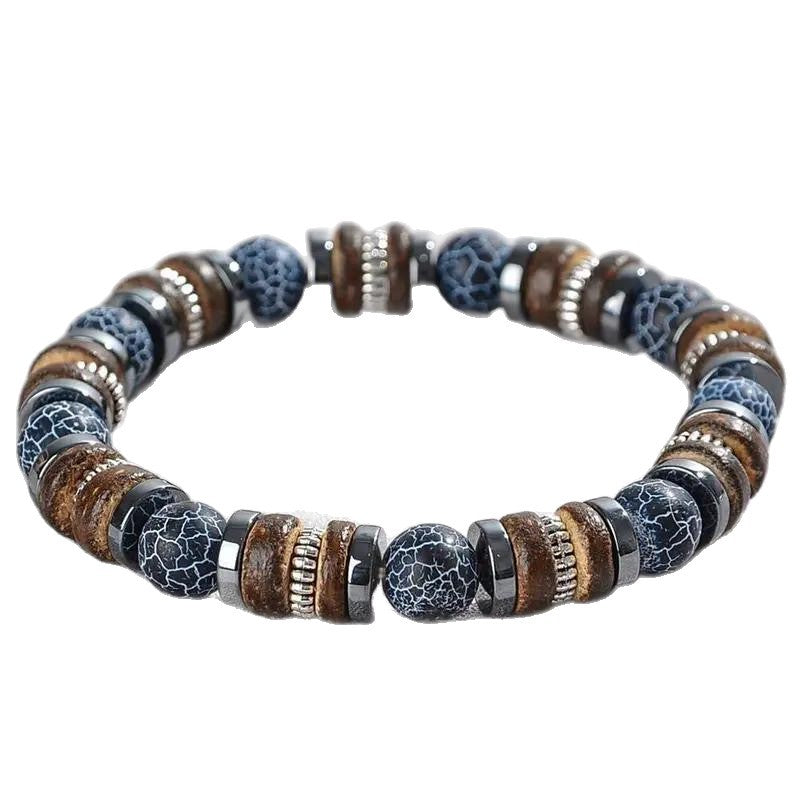 Relic Rift bracelet with crackled dark azure stone and warm wood on white background
