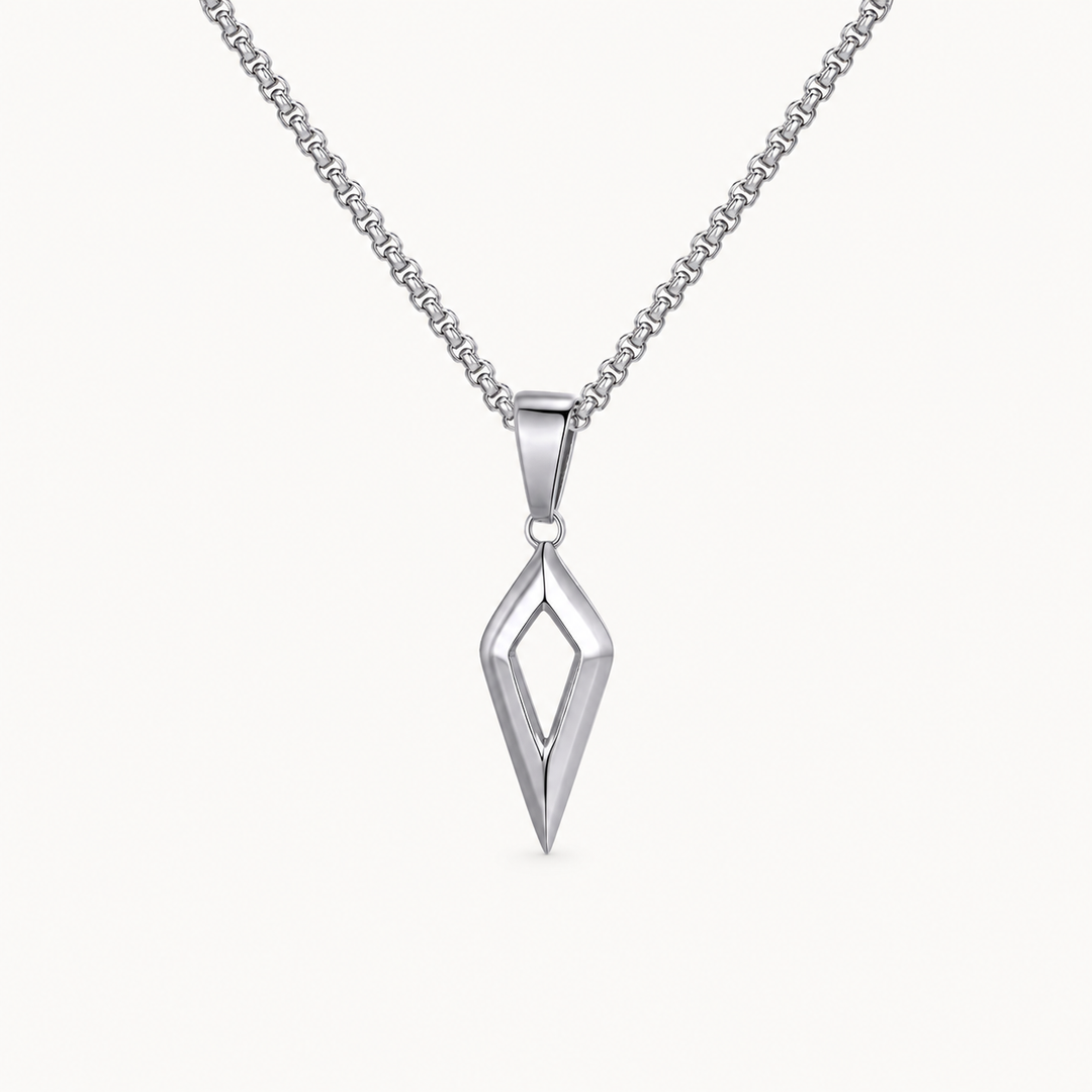 Shard polished silver open diamond necklace on a warm white background