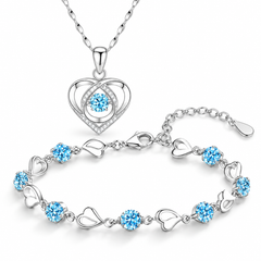 Skye blue heart necklace and matching bracelet on white