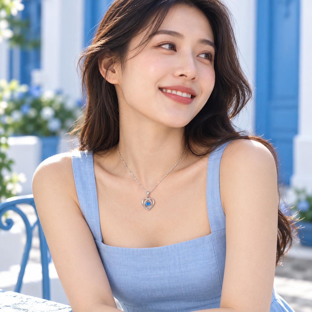 Skye necklace styled with a light-blue dress