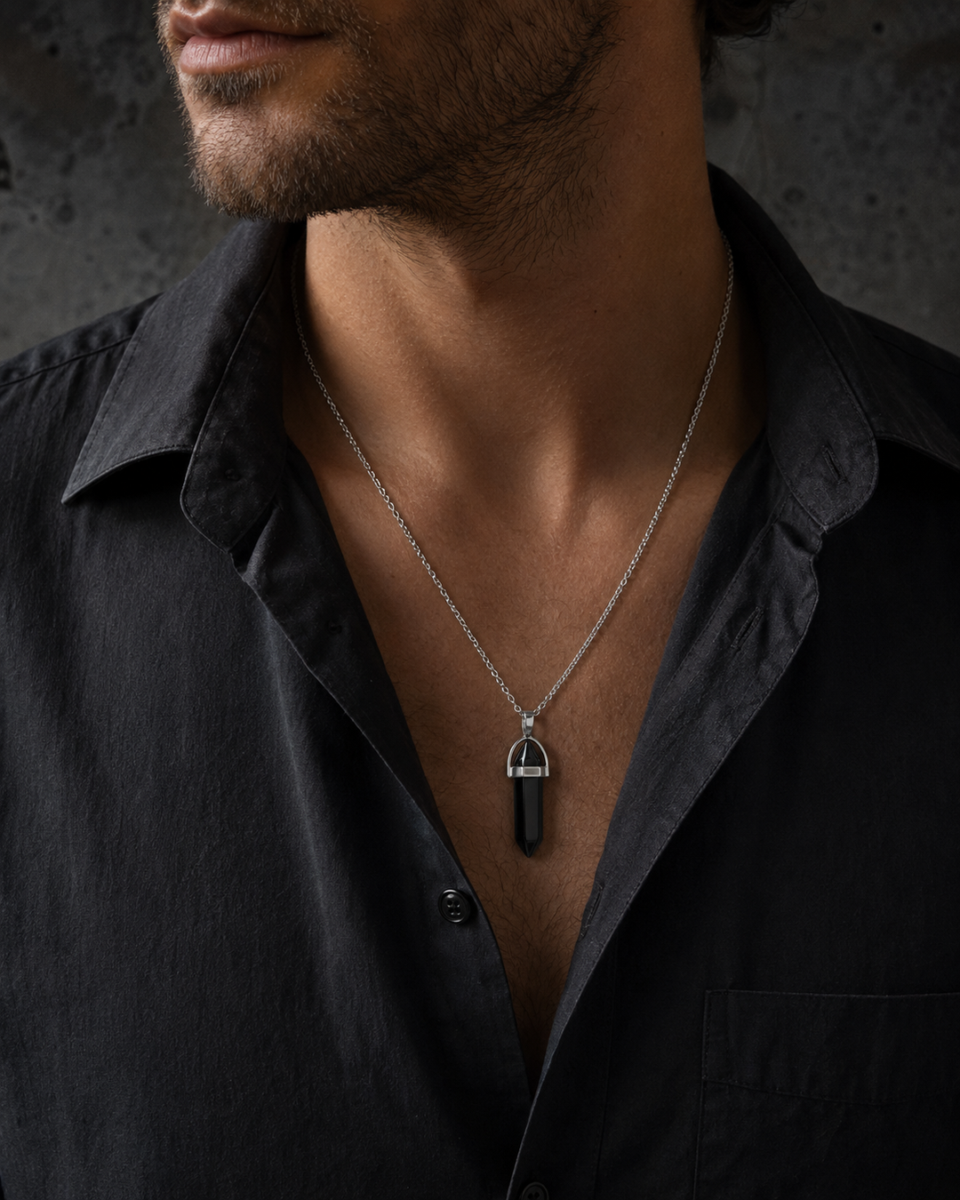 Man wearing the ZAFT Spire Obsidian crystal-point necklace
