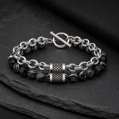 Tether Slate bracelet on layered charcoal slate and black leather