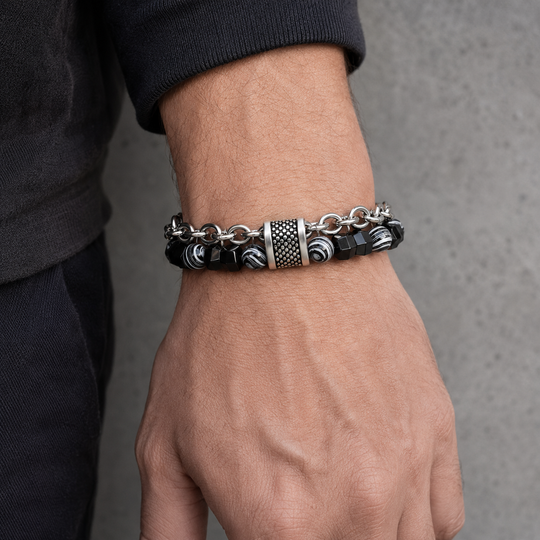 Tether Slate bracelet worn on a man's wrist with a charcoal cuff