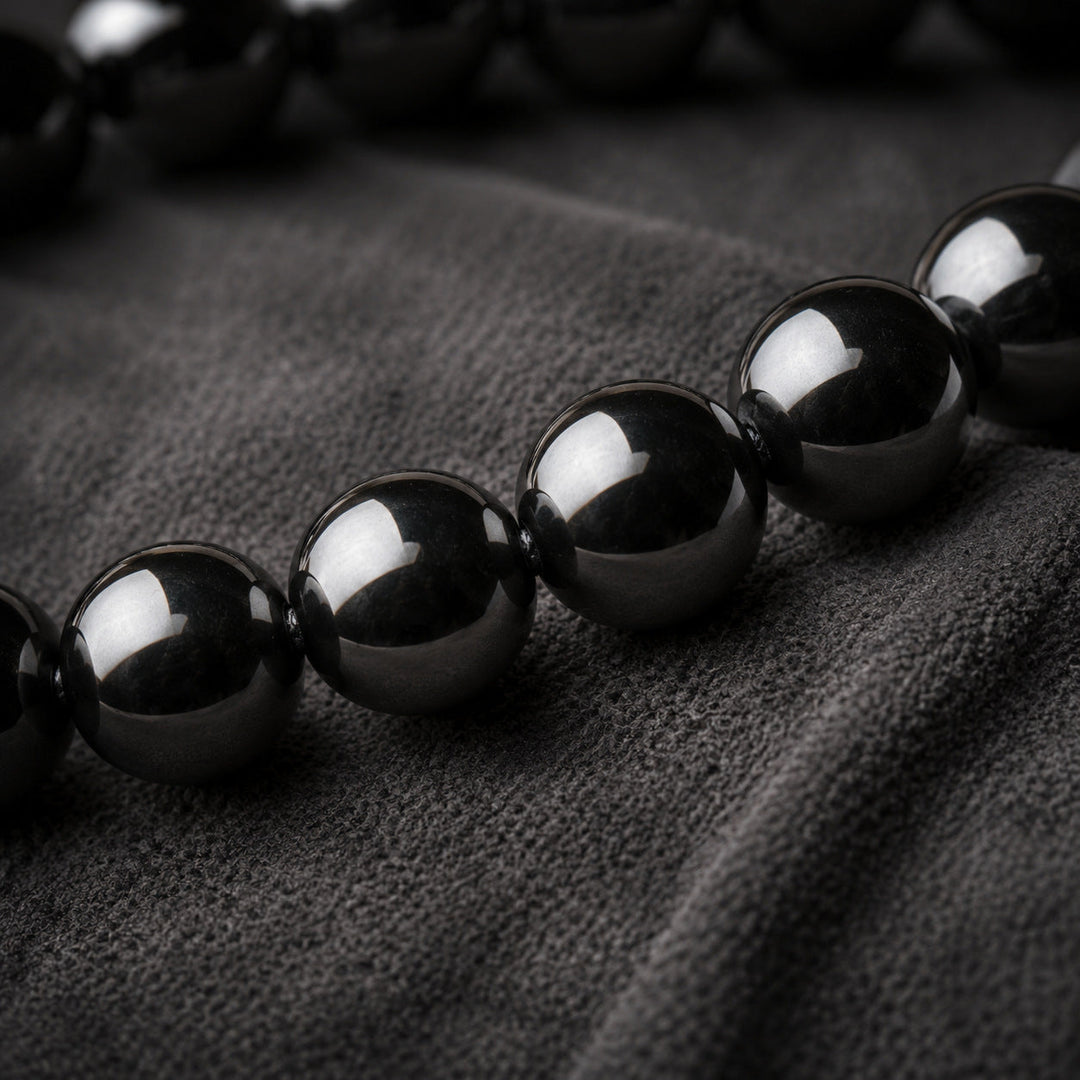 Vestige Noir glossy round hematite beads macro detail