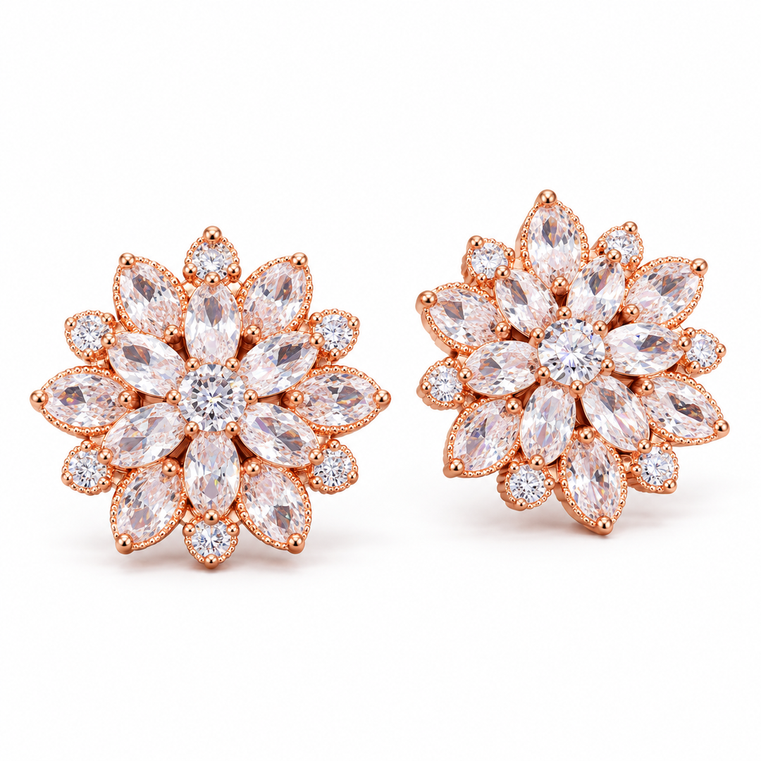 Dahlia flower stud earring pair in Rose, with clear stones and a rose-gold-tone setting, showing the layered marquise petals and round clear centre.